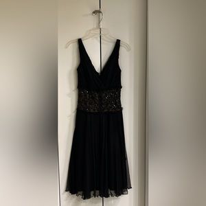 Black sleeveless cocktail dress
